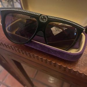 Gucci sunglasses!  Super cute and in great condition.  No scratches.